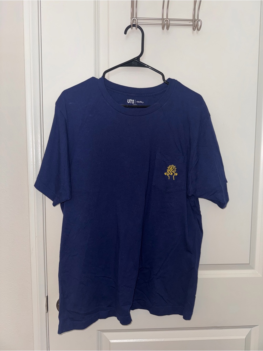 Uniqlo Keith Harring Navy Short-Sleeve Pocket Tee with Yellow Chest Motif
